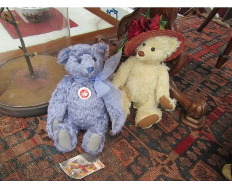 A mauve fur Steiff bear and a Robin Rive example with straw boater (2)