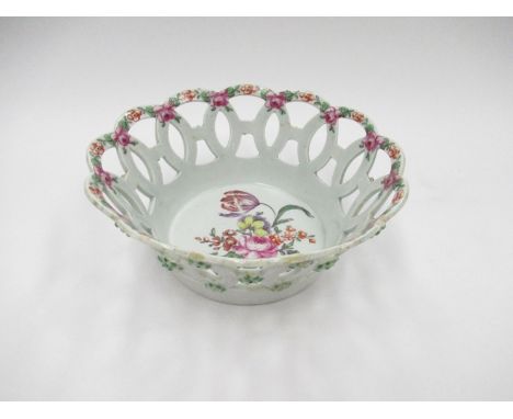 A circa 1770 Worcester polychrome basket, pierced with interlacing rings and floret's, painted with flowers, restored