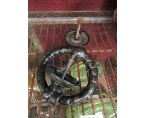 A heavy cast iron door knocker