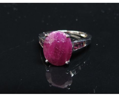 A 9ct white gold ruby dress ring. Size K, 2.5g  