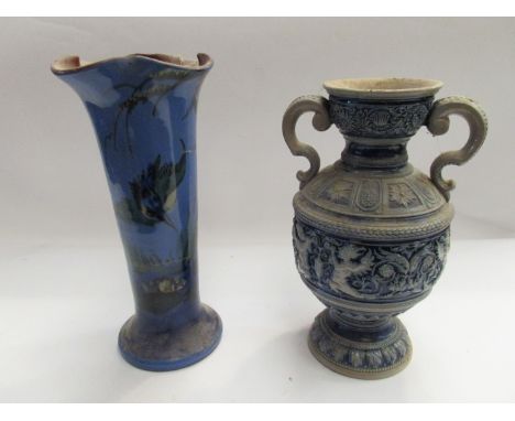 A German Rhenish stoneware two-handled vase (a/f). A Devon pottery blue ground vase,, painted with a lily pond (2 - a/f) 