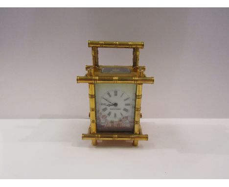 A French carriage timepiece with bamboo design, hand-painted porcelain dial with putti, Roman numerated chapter ring, with ke