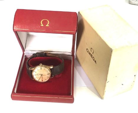 Vintage  boxed 9ct gold Omega gents wristwatch cal 286 hand winding omega leather strap watch is ticking but no warranty give