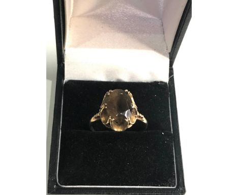 9ct gold smoky quartz cocktail ring weight 2.9g, stone measures approximately: 11.8mm by 8mm