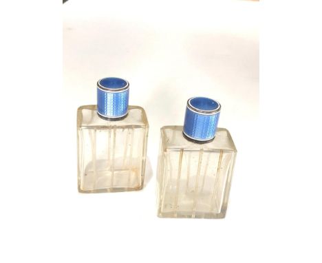 Pair of antique French silver and enamel perfume bottles complete with stoppers in good uncleaned condition enamel in good co