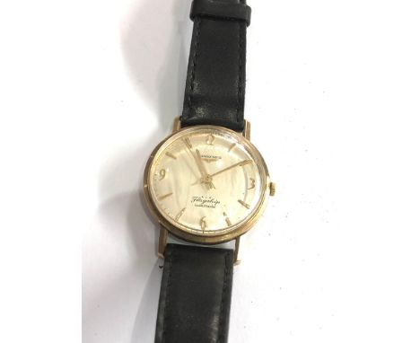 Vintage 9ct gold Longines Flagship automatic gents wristwatch watch is ticking but no warranty is given 