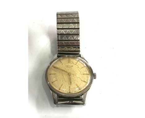 Vintage Longines gents hand winding wristwatch watch is ticking but no warranty given glass  cracked and marked 