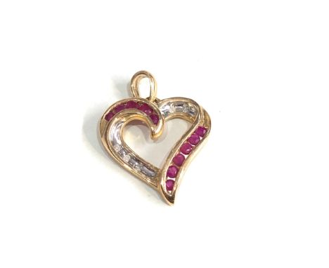 10ct gold ruby diamond heart pendant measures approx 2.4cm drop by 1.8cm wide weight 2.3g 