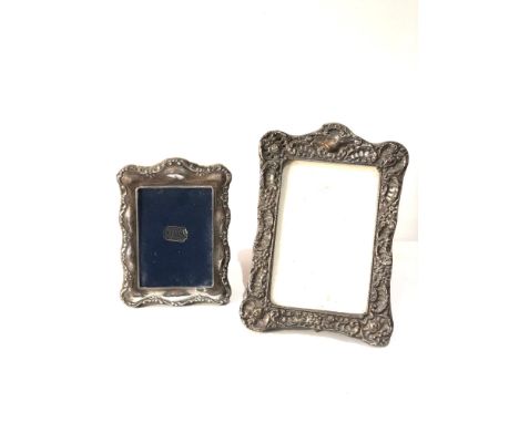 2 vintage silver picture frames largest measures approx 20cm by 14cm age related wear mark 