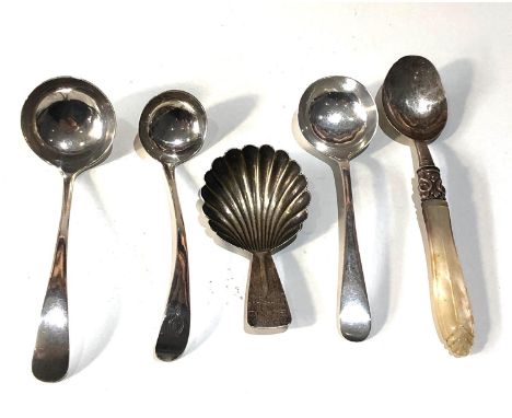 Selection of silver spoons includes caddy spoon sauce ladle spoons etc silver weight approx 80g 