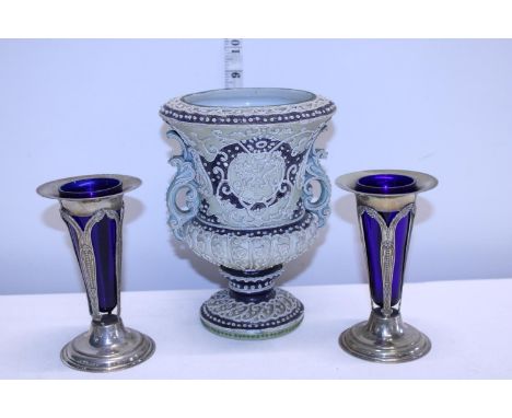 Two early 20th century plated bud vases with blue liners and a small ceramic planter 