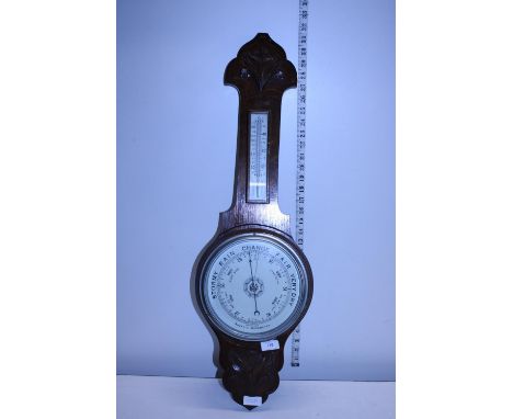 A antique oak cased barometer, shipping unavailable 