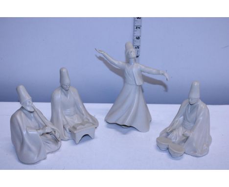 Four assorted ceramic figures 