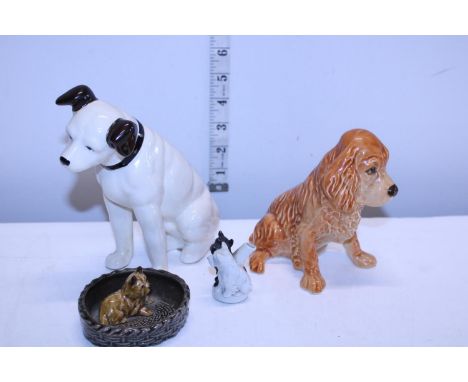 A selection of ceramic figures including Slyvac and Wade 