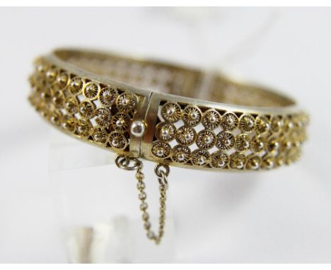 Yellow metal bangle, indistinct makers mark