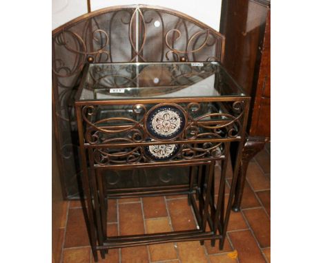 Nest of wrought iron tables with glass tops and a matching fireguard