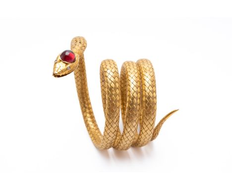 A VICTORIAN GOLD, DIAMOND AND GARNET SNAKE BRACELETThe woven mesh design body and head set with a garnet cabochon and old cut