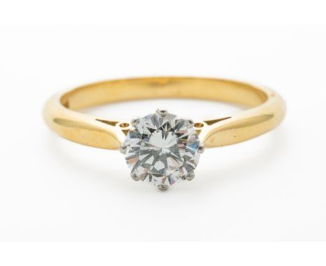 A SOLITAIRE DIAMOND RING (3)Mounted with a claw set round brilliant diamond weighing a stated 0.74 carats, with a stated clar