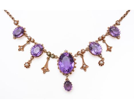 AN AMETHYST AND PEARL FRINGE NECKLACE (2)Mounted with six oval cut amethysts and seed pearl accents all integrated on a belch