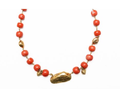 A CORAL NECKLACEThe central seashell integrated pendant in 18ct gold, with other shells and spacers set to the necklace, with