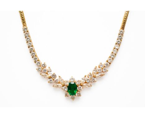 AN EMERALD AND DIAMOND NECKLACEWith a central oval cut emerald measuring 6.6mm x 4.7mm, in a surround of round brilliant cut 