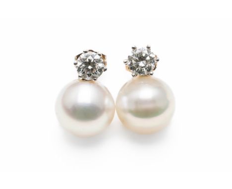 A PAIR OF DIAMOND AND SOUTH SEA PEARL EARRINGSEach set with a round brilliant cut diamond in a claw setting with an estimated
