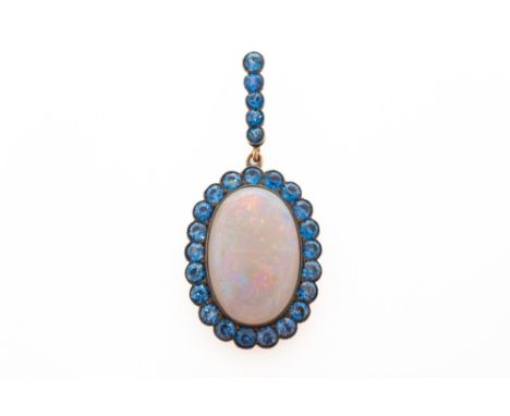A OPAL AND SAPPHIRE OVAL PENDANTWith central opal cabochon measuring 23.9mm x 15.3mm, in a surround of round cut sapphires, w