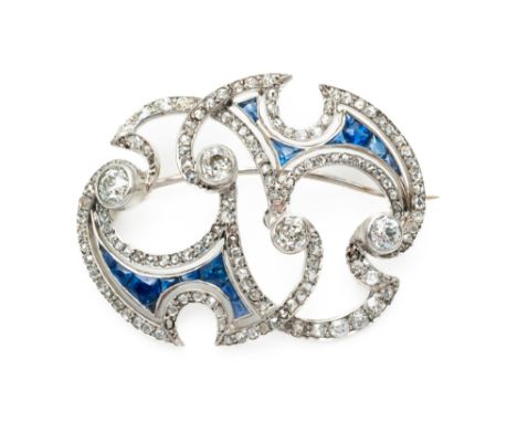 A SAPPHIRE AND DIAMOND BROOCHIn an openwork shaped oval design, in the Art Nouveau taste, collet set with four principal old 
