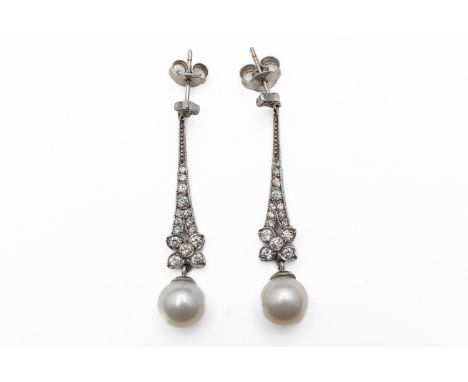 A PAIR OF DIAMOND AND PEARL DROP EARRINGS (3)With round brilliant cut diamonds set to the floral motif drop, suspending a 8.3
