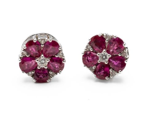 A PAIR OF RUBY AND DIAMOND EARRINGSDesigned as floral clusters with pear cut rubies and round brilliant cut diamonds, with po