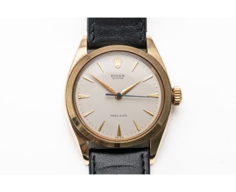 A GOLD ROLEX OYSTER PRECISION (3)With cream signed dial with baton hour markers, in a 9ct case approximately 34mm in diameter