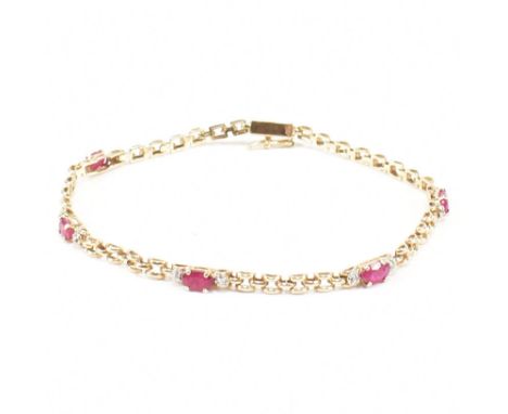 A hallmarked 10ct gold diamond and synthetic ruby bracelet. The gold bracelet having five oval cut synthetic rubies flanked b