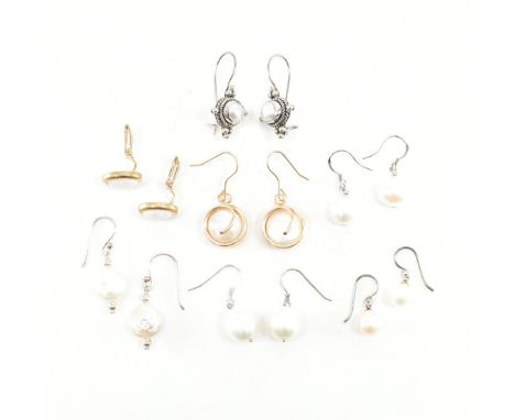 An assorted collection of pearl set earrings. The lot to include; a pair of 925 silver twisted &amp; prill detailing, gold to