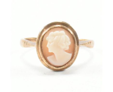 A vintage 9ct gold camo ring. The ring having an oval shaped carved cameo portrait depicting a young lady bezel set to reeded