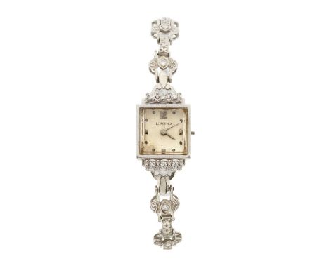 LonginesA cocktail watchCase: Signed. 14k gold American convention marks. Case number 6638354. Factory diamond set. Length (e