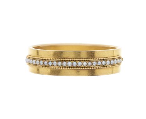 A late Victorian 18ct gold pearl hinged bangle bracelet, inner diameter 5.5cm, width 1.5cm, with case, 32.7gOverall good cond