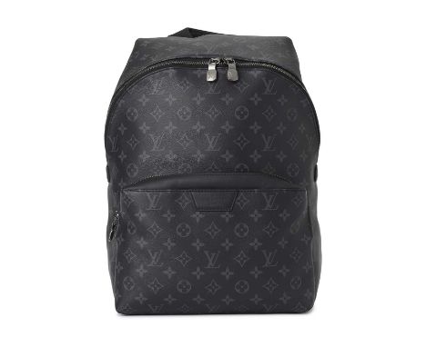 Louis Vuitton, a monogram eclipse Apollo backpack, designed with a black and grey monogram coated canvas exterior, smooth bla