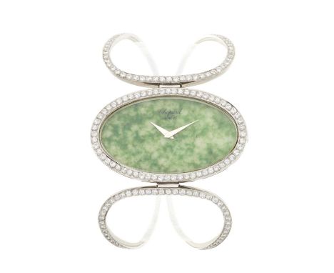 ChopardA bracelet watchCase: Signed. 18ct gold. Hallmarks for London 1971. Reference 5038. Serial 31871. Factory diamond set 