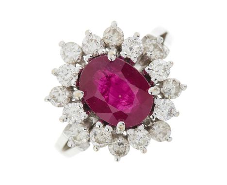 An 18ct gold Thai ruby and brilliant-cut diamond stepped cluster ring, with photocopy of a report by the Gem Studies Laborato