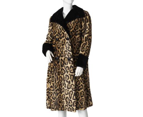 Bergdorf Goodman, a faux fur coat with real seal fur trim, featuring a stencilled leopard patterned faux fur exterior, with a