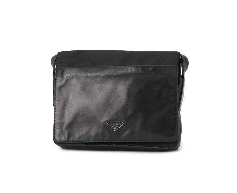 Prada, a black Tessuto Nappa handbag, designed with soft lambskin leather and durable nylon exterior, featuring two exterior 