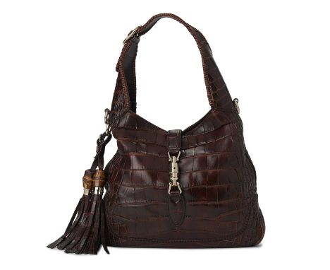 Gucci, a crocodile Jackie shoulder bag, crafted from luxurious brown crocodile skin, featuring gold-tone hardware, single han