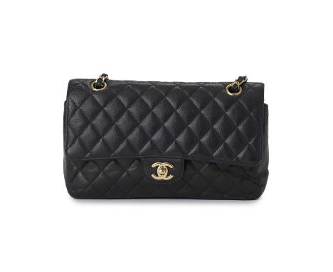 Chanel, a Medium Classic Double Flap handbag, designed with a diamond quilted caviar leather exterior, with gold-tone hardwar
