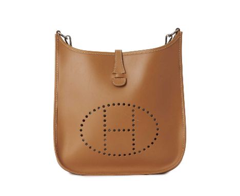 Hermes, a 2000 Evelyne I PM handbag, crafted from natural brown box calf leather, featuring a detachable canvas shoulder stra