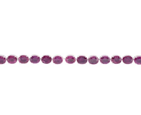 An 18ct gold oval-shape ruby line bracelet, with push-piece clasp, estimated total ruby weight 50ct, hallmarks for Birmingham