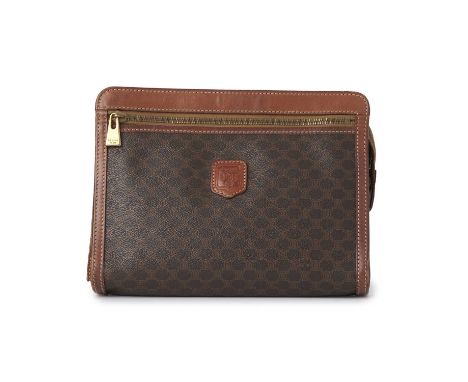 Celine, a vintage Macadam wristlet clutch, featuring the maker's brown monogram coated canvas exterior with tan leather trim,