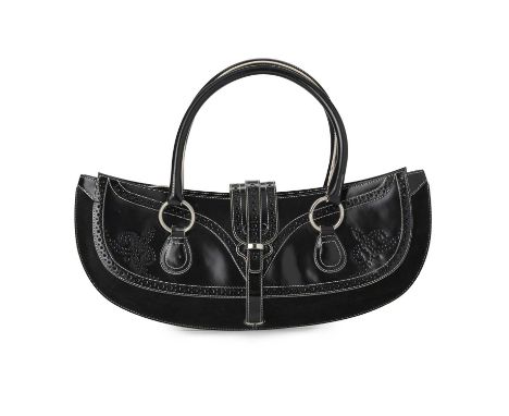 Tanner Krolle, a large baguette handbag, featuring a smooth black leather exterior with perforated detailing and black suede 