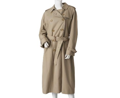 Burberry, a ladies classic trench coat, designed with a notched lapel collar, buttoned epaulettes, deep back yoke, double-bre