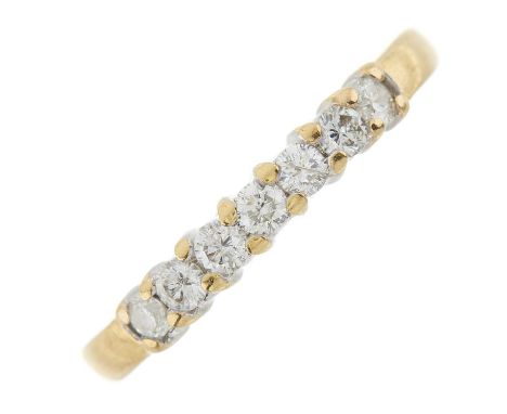 An 18ct gold brilliant-cut diamond seven-stone ring, total diamond weight 0.33ct, engraved to band, estimated I-J colour, pre