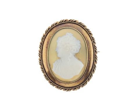 A late Victorian gold green agate cameo portrait brooch, carved to depict a lady in profile, with rope twist surround, length